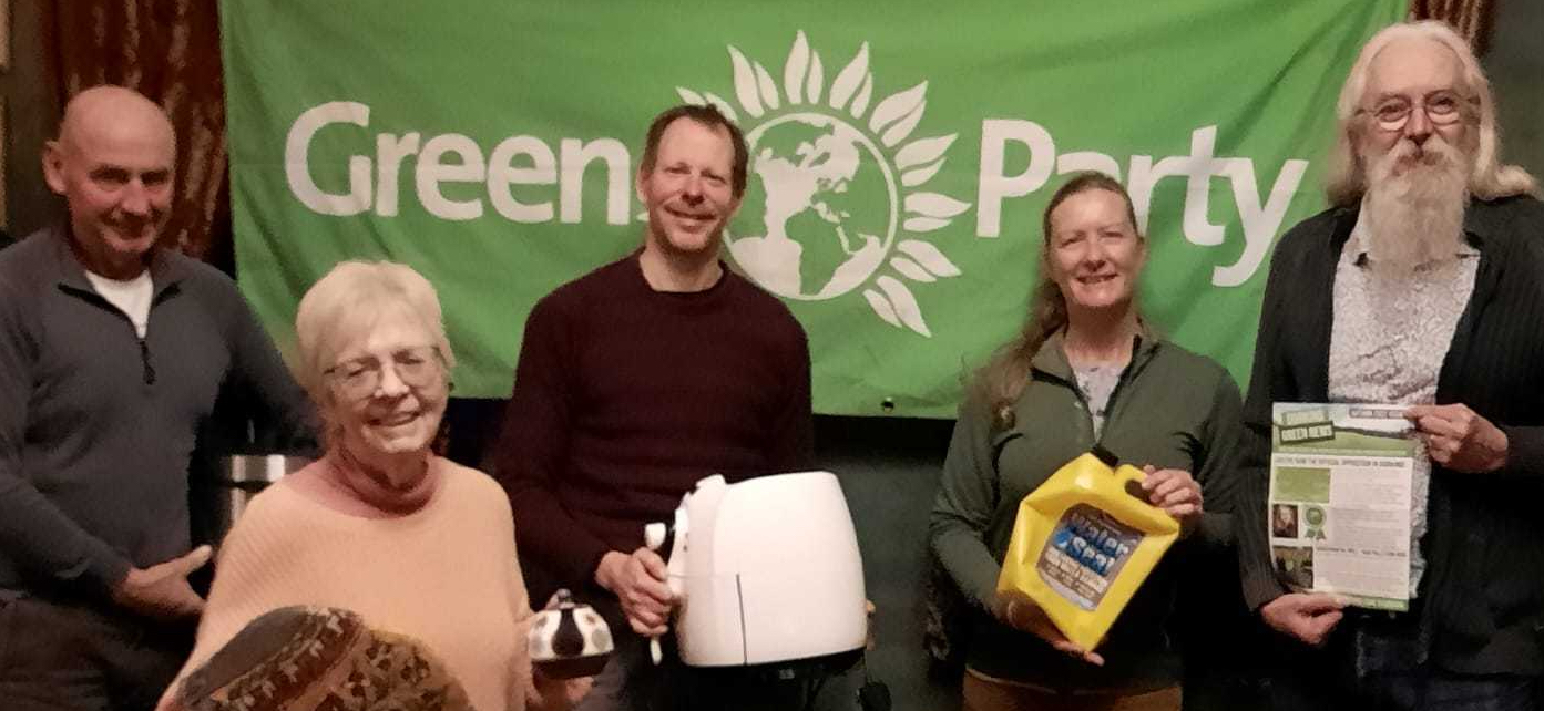 Local Green Party members with items to help reduce energy costs