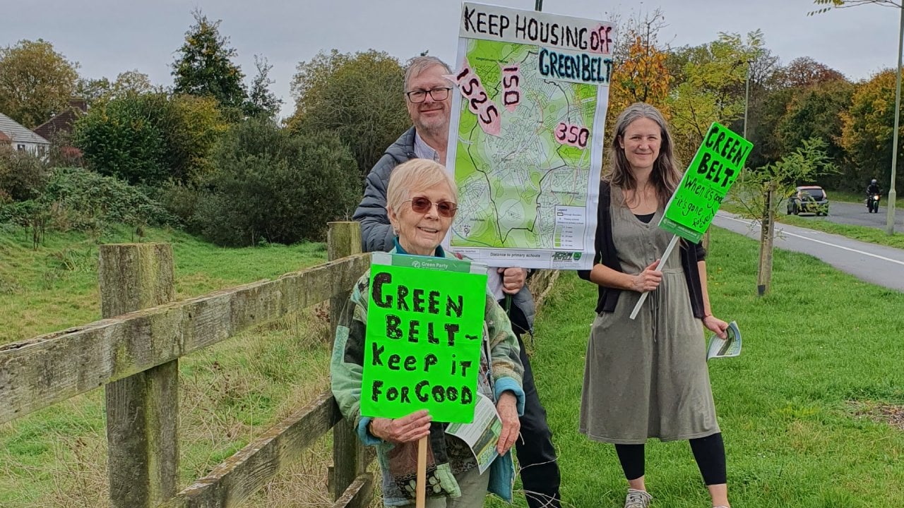 Epsom and Ewell members with banners